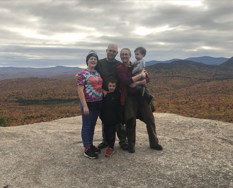 Andrew Manuse and family on mountains